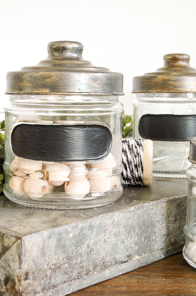 DIY dollar tree project with small storage jars with a diy aged lid